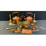 A 19th century copper kettle; another; pair of brass ejector candlesticks, chestnut roasters, etc.
