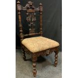 A Victorian Gothic Revival Side Chair, c.1880, 102cm tall.