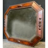 An oak framed wall mirror, 64cm x 54cm