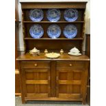 A priory style oak dresser, two tier back above pair of frieze drawers and cupboard doors, 177cm