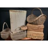 Wickerwork; a mid 20th century hamper basket, and another similar; an early 20th century 'Garden'