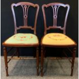 A Pair of Edwardian Mahogany Bedroom chairs, pierced splat, turned legs and stretchers, padded