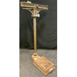 A set of 20th century W.T Avery floor standing cast iron scales, Birmingham, 122cm high.