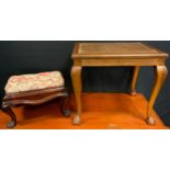 A Victorian mahogany foot stool, upholstered drop in top; another cane topped (2)