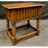 A late 19th century, gothic revival oak small blanket box on stand, 47cm high, 48cm wide, 30cm deep.