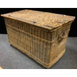 A Large wicker linen basket, on wheels, 70cm high, 120cm wide, 65cm deep.