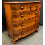 An Early Victorian Mahogany Bow Front Chest of Drawers, two short, over three long, graduated