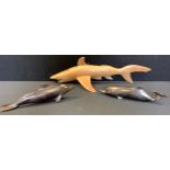 A Christy Warren Pitcairn Islands carved wooden shark; others smaller dolphins (3)