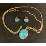An opal pendant necklace and conformig earrings,