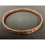 A 9ct gold rose gold bangle, 11.4g