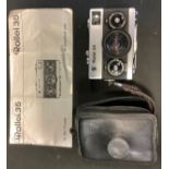A Rollei 35 compact camera with instructions, serial no 6011426.