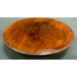 A 19th century mahogany Lazy Susan, turned rim, 38cm diam, c.1850