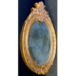 A Reproduction, Louis xvi style oval mirror.