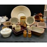 A large stoneware Pancheon; a pineapple topped jelly mould, another; Butter dish; cream oven loaf