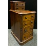 A Victorian walnut gentleman's chest of narrow proportions, two short drawers above four long