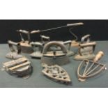 Metalware - a Silversters patent cast iron flat iron; others Middletons, slug irons, poker iron,