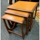 A G plan teak nest of three occasional tables, two tone top, shaped supports, largest 51cm high,