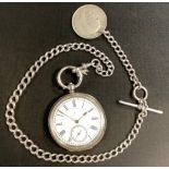 A continental 935 silver open face pocket watch, white enamel dial, bold Roman numerals,