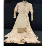 Fashion & Textiles - a Victorian hand made wedding gown, high collared lace neck, embroidered floral