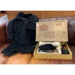 An Astrakan London lady's black lambs wool coat, approx size 12-14; a needlework shoulder bag; black