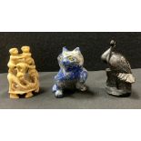 A carved sodalite figure as a Cat paw raised,10cm high; Tumbling Monkeys Tower; black stone stork (