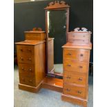 A Victorian mahogany dressing chest, central rectangular looking glass flanked by four graduated