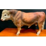 A large model of a Bull, 48cm high, 79cm long.