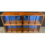A pair of unusual Edwardian oak wall mounting two door display cabinets of small proportions, 26.5cm