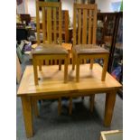 A Contemporary Solid Oak Extending Dining Table, with conforming set of four dining chairs (faux