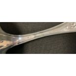 A Tiffany & Co sterling silver crumb scoop, floral pan, shaped handle, 100.3g