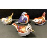 A Royal Crown Derby robin paperweight, gold stopper, boxed; others Gold Crested Tit, Wren etc, all