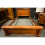 A King Size Mahogany bed frame.