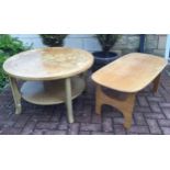 A retro mid 20th century teak circular two tier coffee table. wheel spoked top, shaped supports