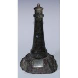 A Cornish serpentine model, of Longships Lighthouse, Land's End, Cornwall, 26cm high, early 20th