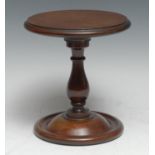 A 19th century turned mahogany candle stand, domed base, 18cm high