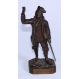 A 19th century dark patinated cabinet bronze, of an 18th century gentleman dressed a la mode, with