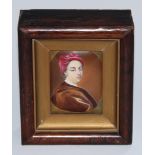 A George III enamel portrait panel, of a gentleman wearing a turban, within a feigned oval, 8.5cm