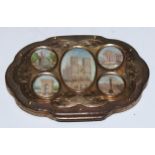 A 19th century French Palais Royale shaped oval purse, apllied with architectural miniatures of
