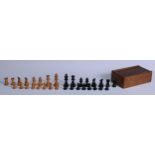 A boxwood and ebony Staunton pattern weighted chess set, the Kings 7.5cm, oak box