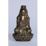 A Chinese bronze Buddha, seated in meditation, upon a lotus, wearing robes, 15cm high