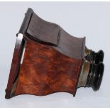 A 19th century amboyna and mahogany hand held stereoscopic viewer, 19cm wide, c.1890