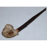 A 19th century French macabre novelty clay pipe, by Gambier of Paris, as a skull, the memento mori