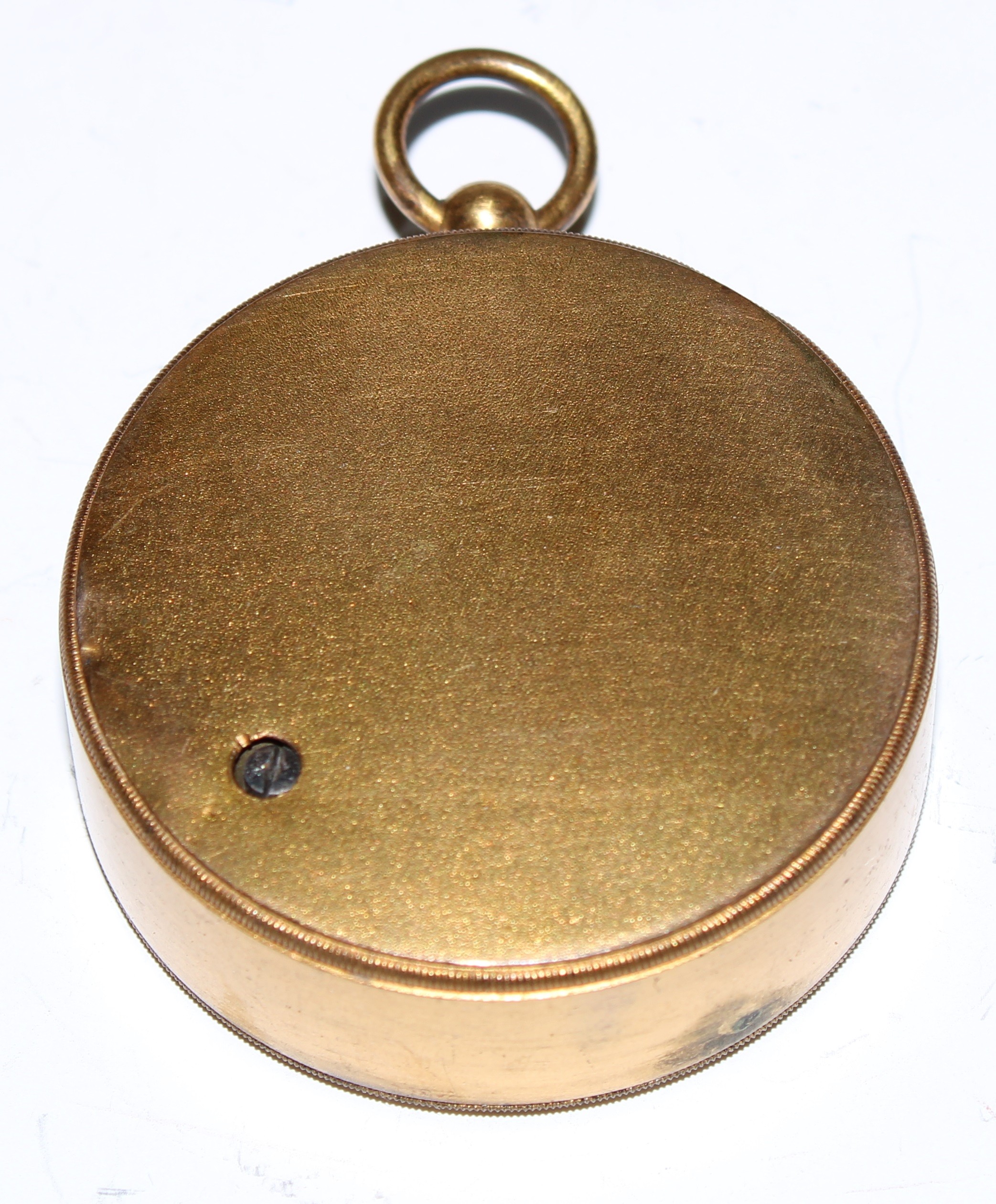 A Victorian gilt brass aneroid pocket barometer, 4.5cm silvered dial inscribed W Dixey, 241 Oxford - Image 3 of 4