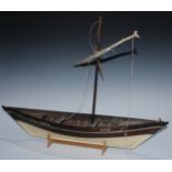 A scratch-built maritime model, of a dhow boat, inscribed Lulu, Lamu (Kenya), II, 82cm long