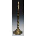 A large 19th century brass candlestick, campna sconce, knopped pillar, domed base, 75cm high