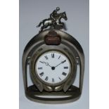 An early 20th century mantel timepiece, of equestrian interest, the 8.5cm enamel clock dial