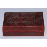 A Chinese cinnabar lacquer rectangular box and cover, carved with a sage and an elder in a