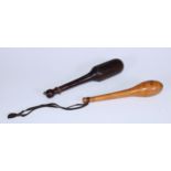 Treen - a turned boxwood fishing priest, 21.5cm long; another (2)