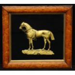 A 19th century gilt metal applique, cast as a race horse, maple frame, 41cm x 43cm