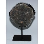 Natural History, Geology - a geode, spliced to show the crystalline matrix, mounted for display,
